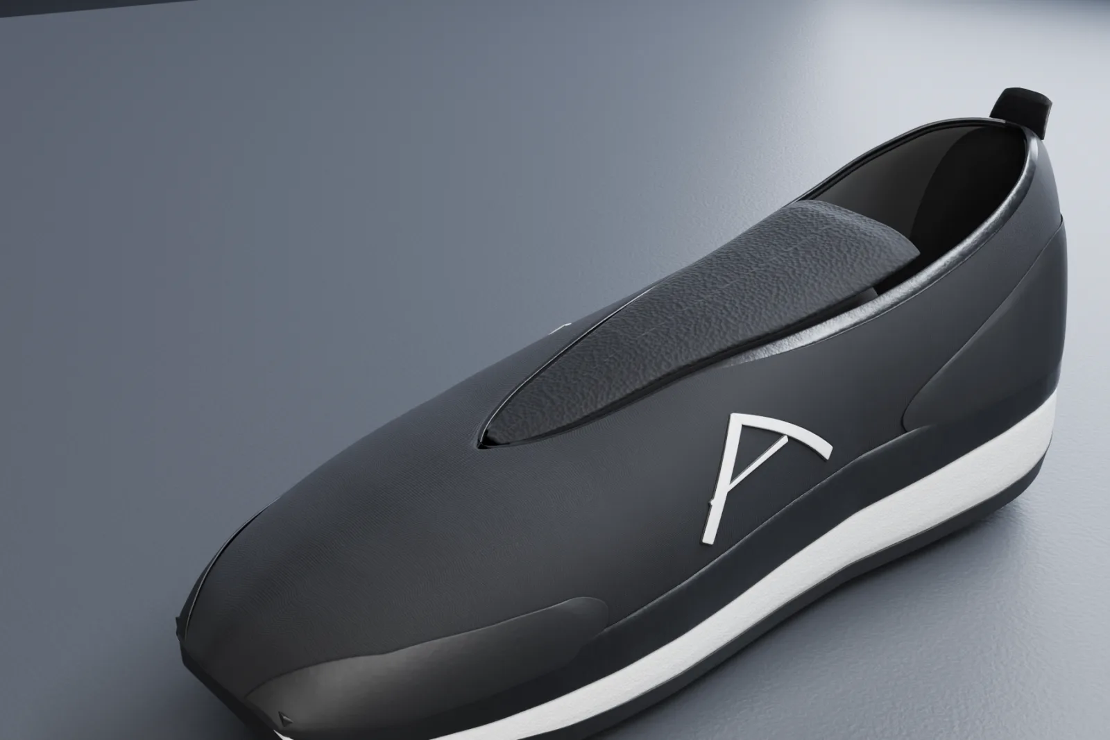Close view of the padded tongue sitting in the throat of the shoe, joined to the sides of the vamp by an elastic gusset.